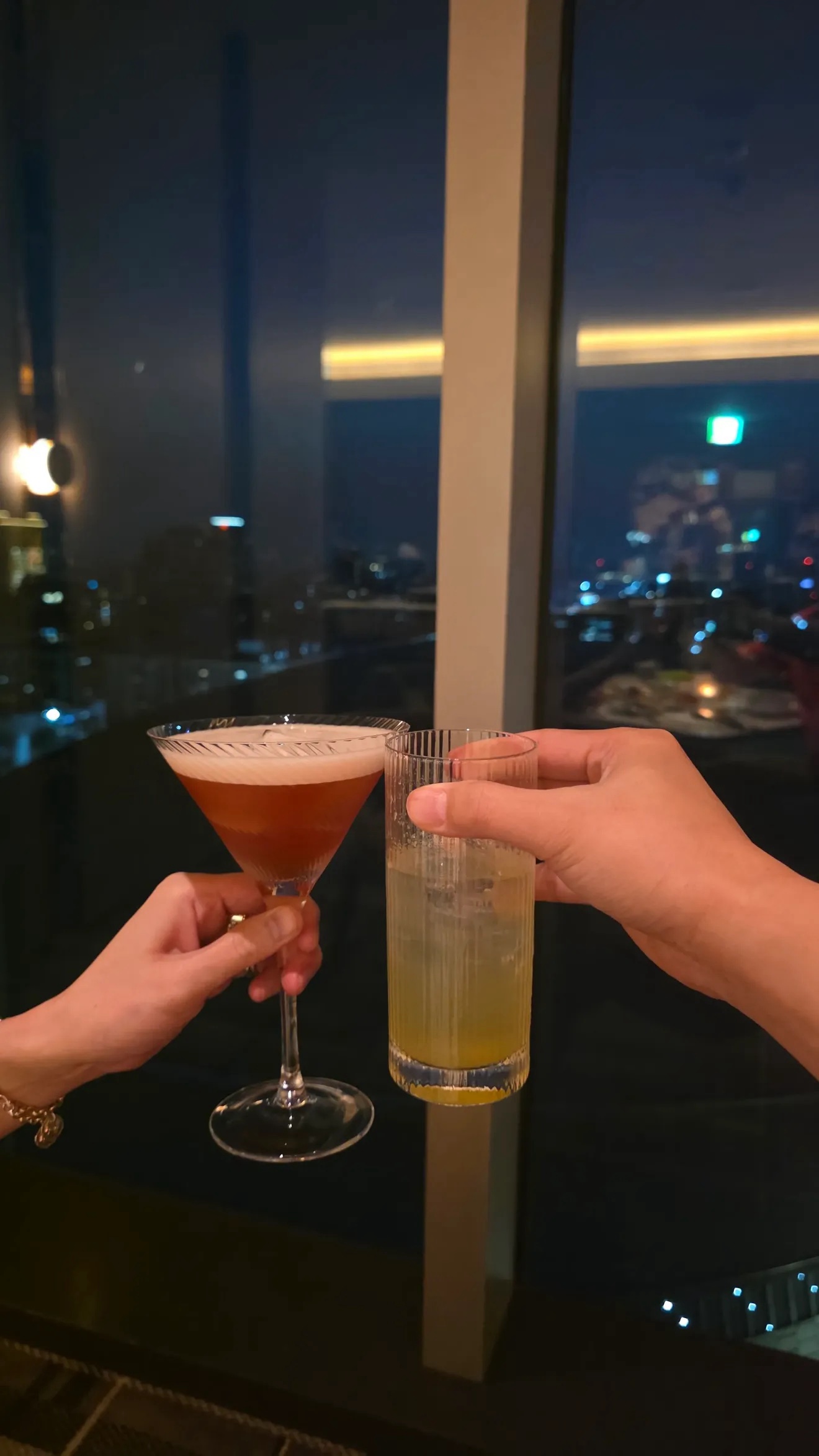 Cocktail cheers at night