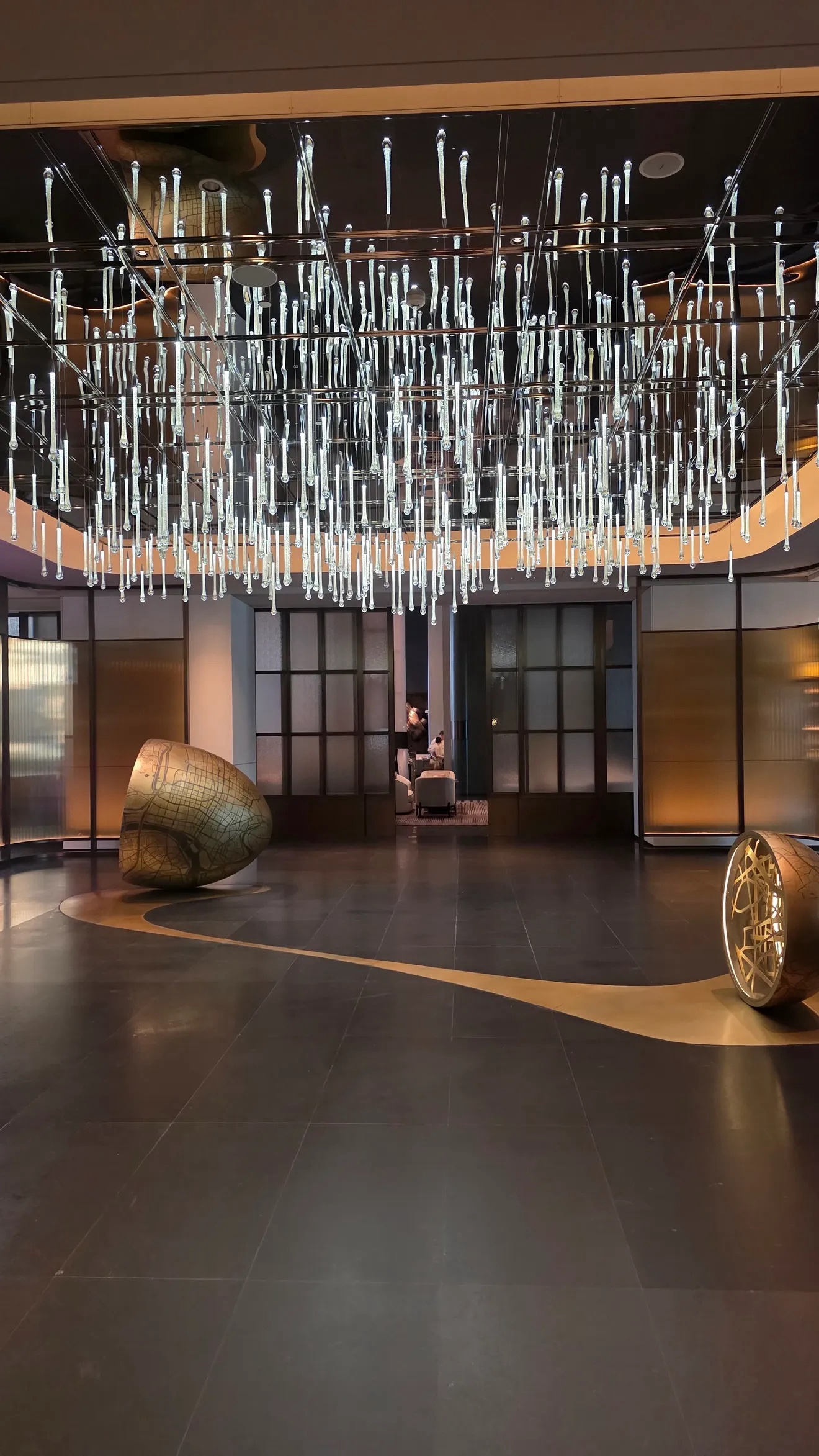 Soaring lobby with crystal chandelier