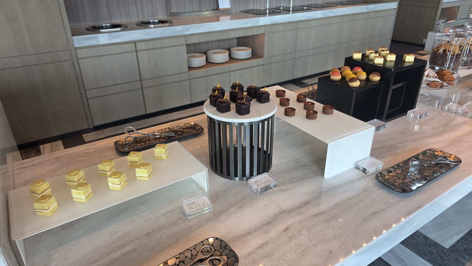 The dessert counter: cakes, mousse cups and mini tarts