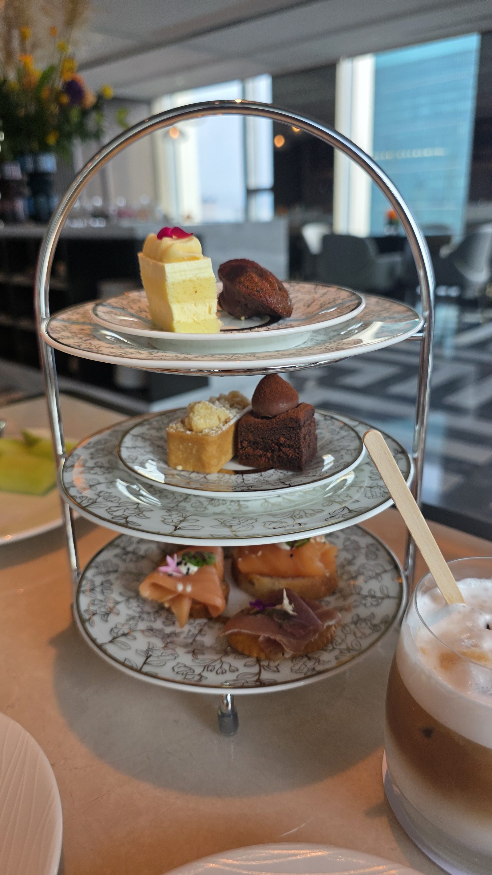The stand up close: cakes on top, savoury bites below