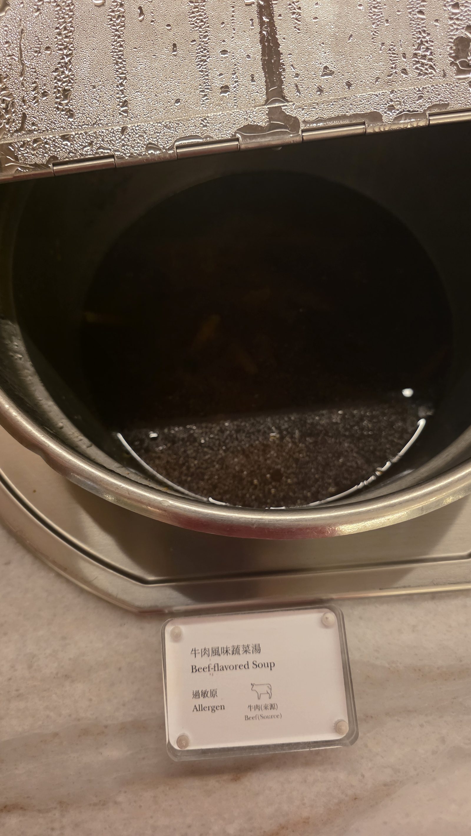 The beef-flavoured vegetable soup in its pot