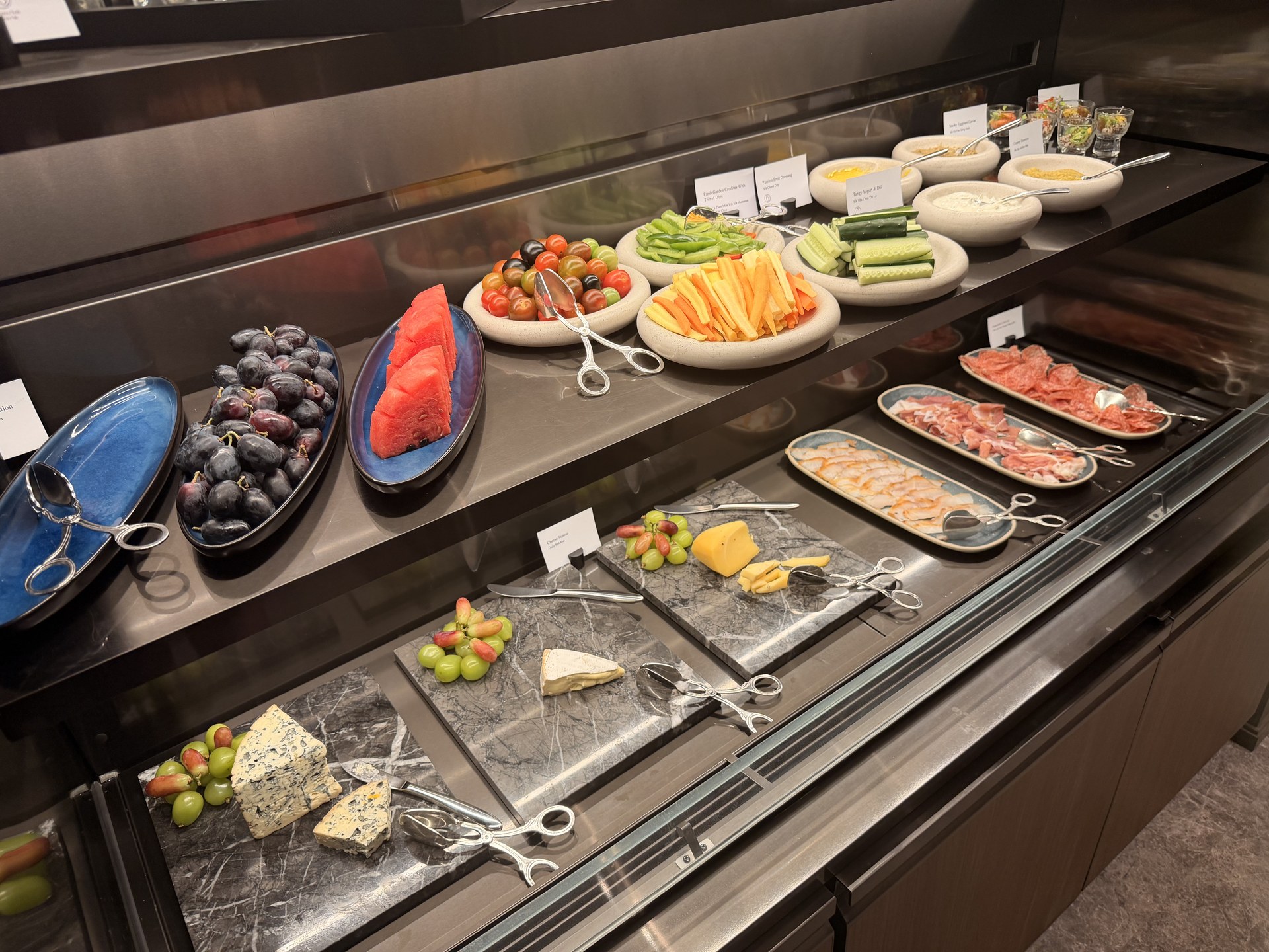 The cold station: cheese, cold cuts, salads and fruit.